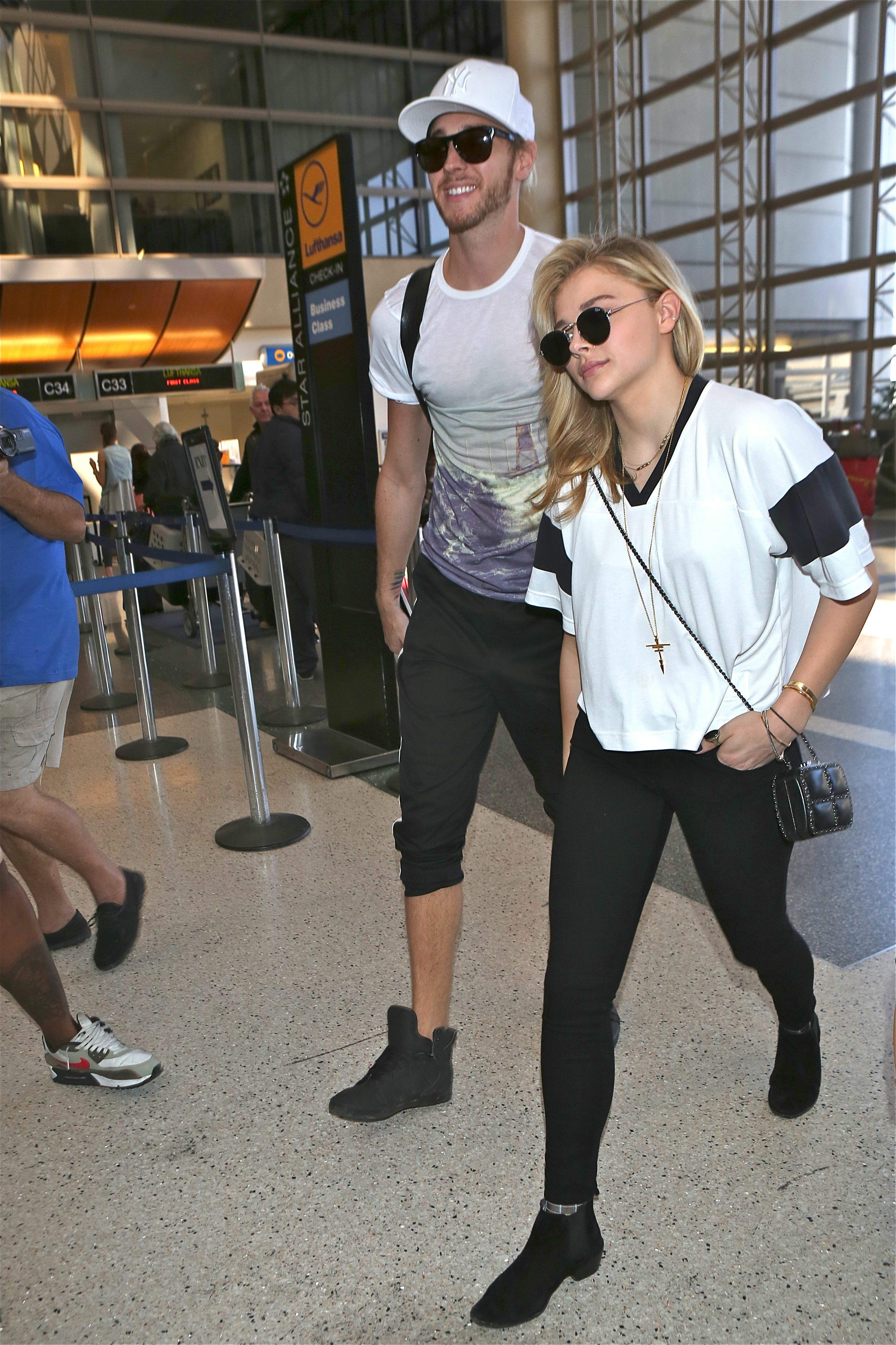 Chloe Moretz - LAX airport in LA March 099.jpg