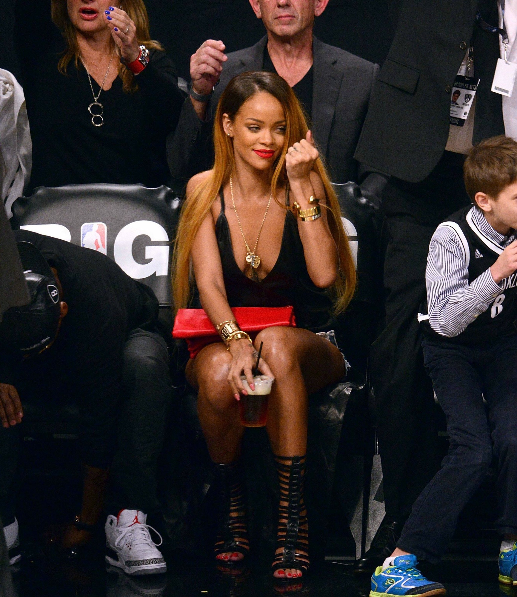 Rihanna watches Chicago Bulls v Brooklyn Nets in Brooklyn 4.5.2013_72.jpg