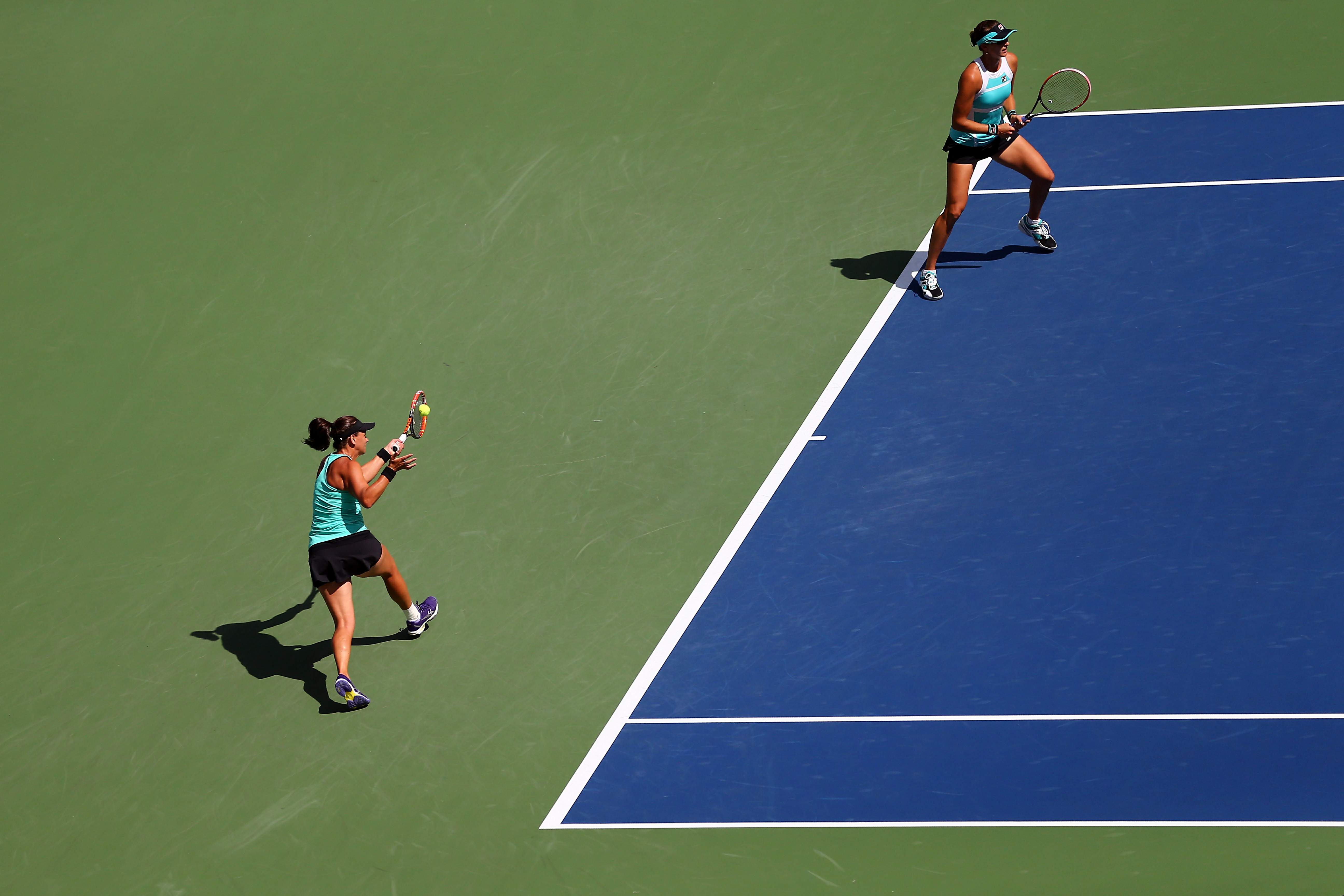 Martina Hingis and Sania Mirza celebrate with the winner's trophy_06.jpg