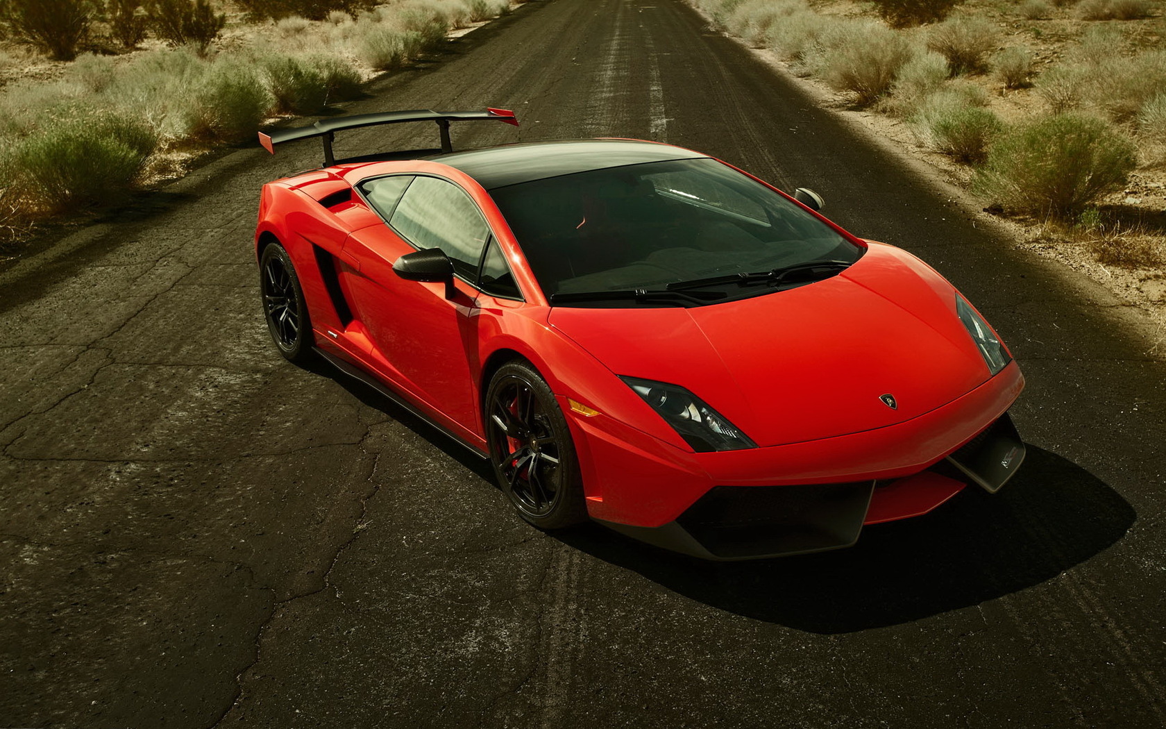383322_lamborgini_gallardo_doroga_Lamborghini_1920x1165_(www.GdeFon.ru).jpg